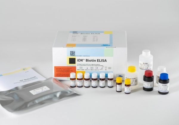 The components of the Immundiagnostik Biotin ELISA laid out in front of a white background.