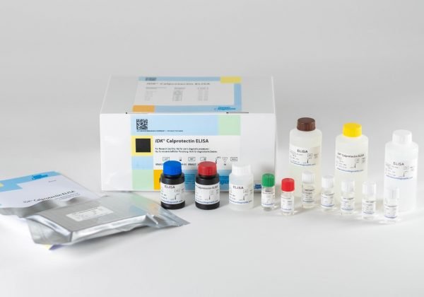 The components of the Immundiagnostik Calprotectin ELISA laid out in front of a white background.