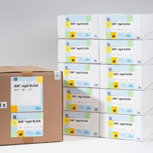 A photo comparison of our sIgA ELISA Bulk Pack (20 Plates) versus the equivalent of 20 individual sIgA kit boxes.