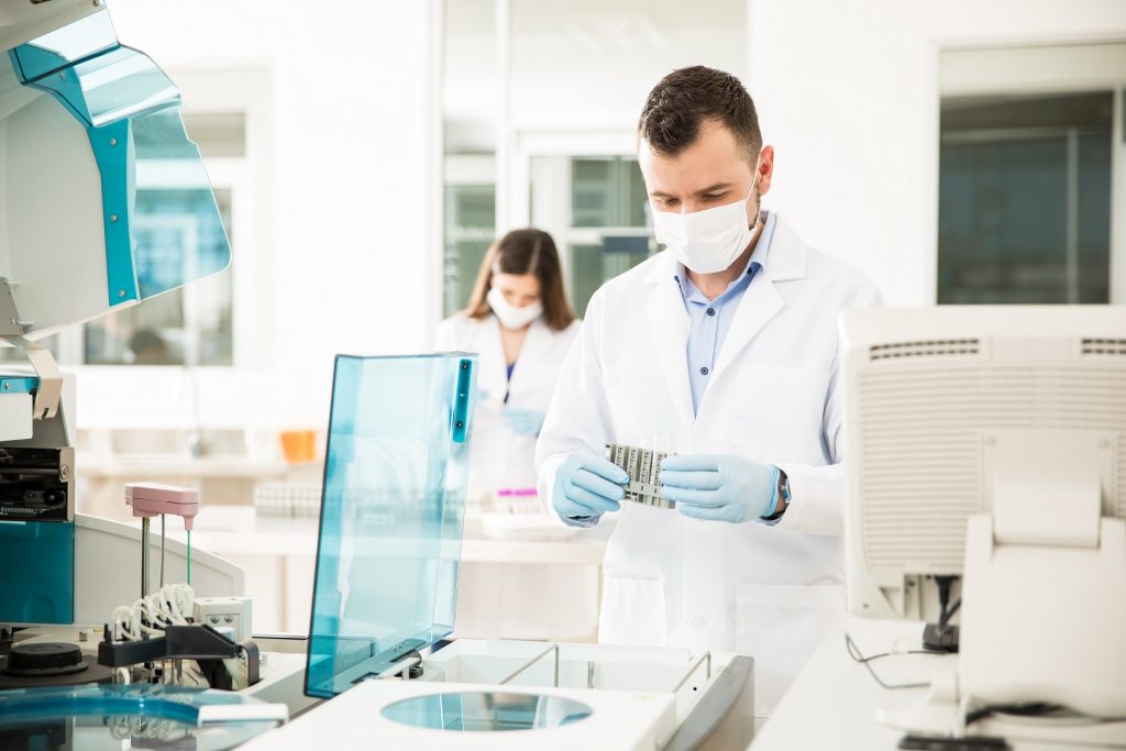 A scientist working in a clinical laboratory.