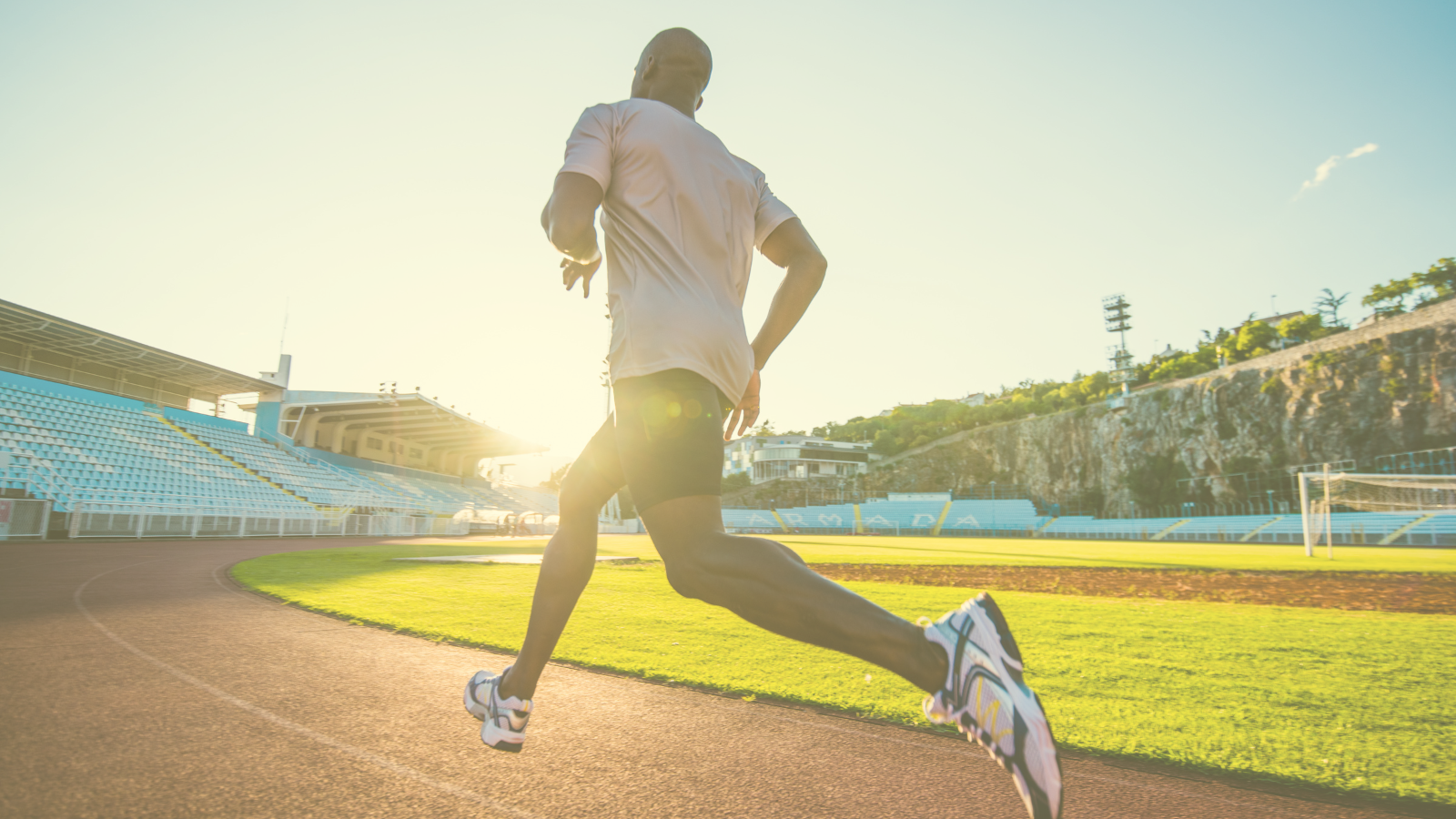 An athlete running on a track.