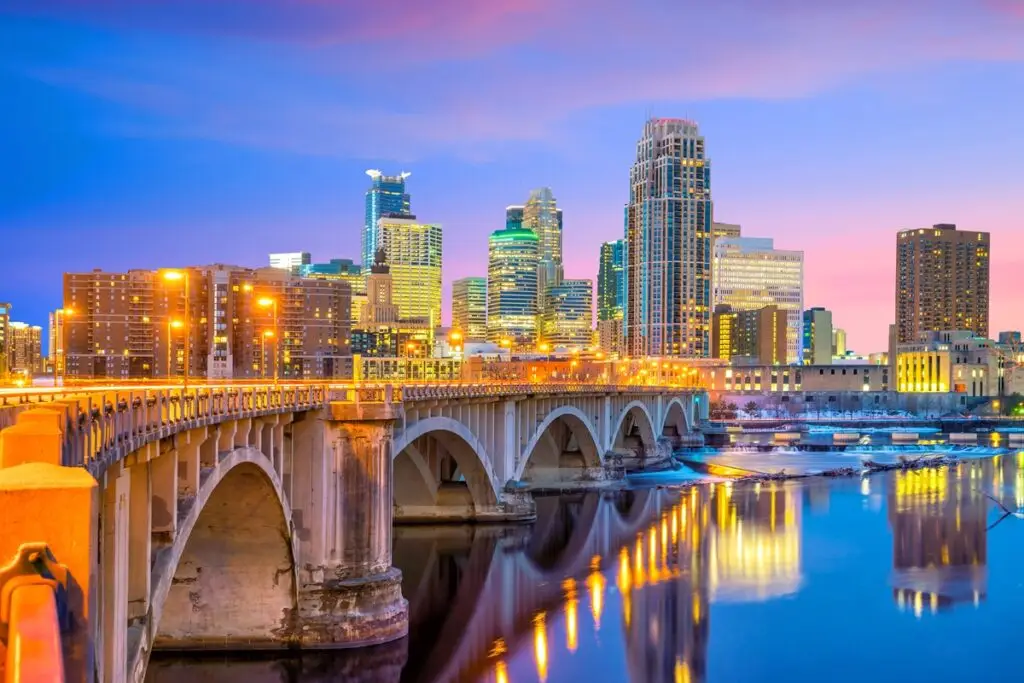 The downtown Minneapolis skyline at sunset.